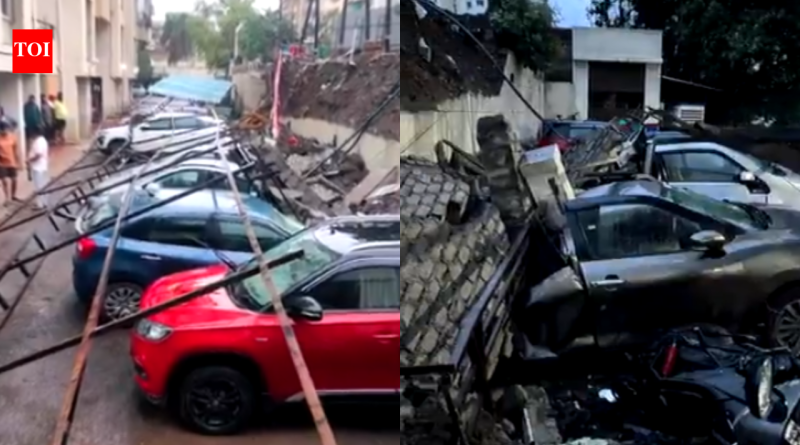 मुसळधार पावसामुळे पुणे सोसायटीत भिंत कोसळली, 14 वाहनांचे नुकसान मुसळधार पावसामुळे पुणे सोसायटीत भिंत कोसळली, 14 वाहनांचे नुकसान